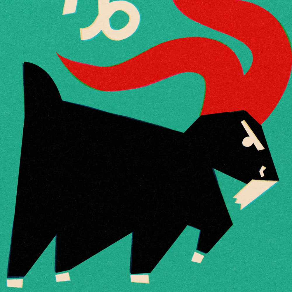 Close-up of Capricorn print showing angular black goat body and flowing red tail beneath the zodiac symbol.