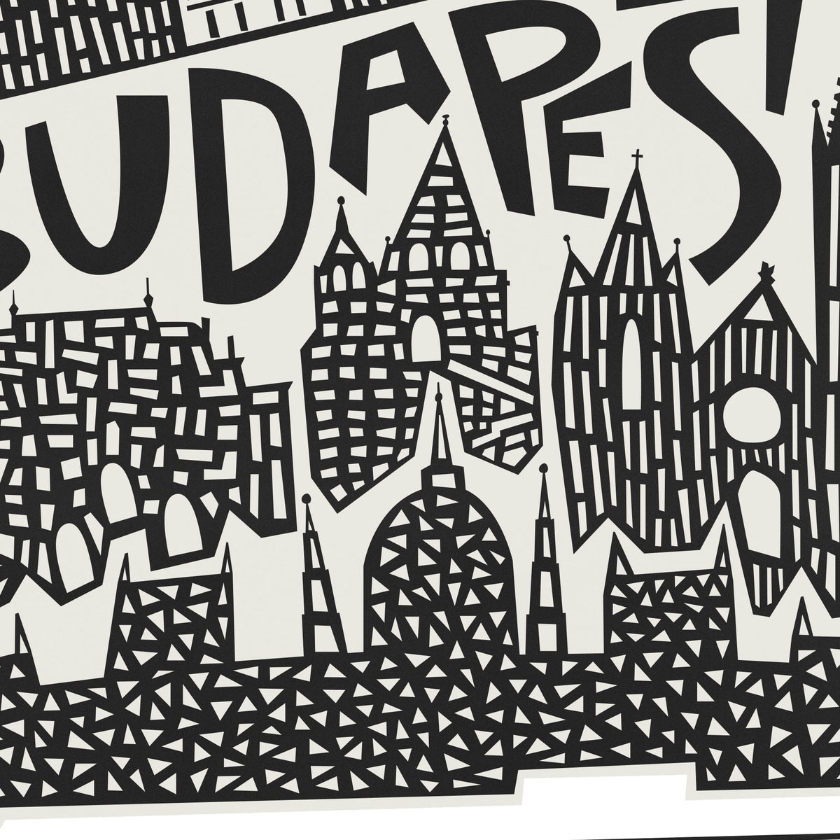 Black and white graphic art print featuring a stylized cityscape of Budapest with the word 'BUDAPEST' in large bold letters across the top, rendered in a cutout paper-cut style with geometric patterns.