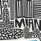 A close-up of a black and white graphic print featuring stylized city buildings and the word 'MIAMI' in bold letters.