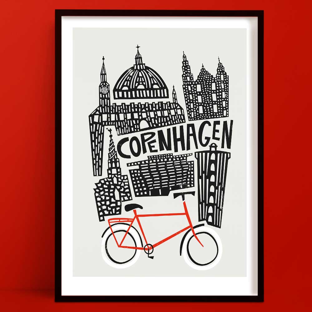 A bold black-and-white illustration of Copenhagen’s iconic architecture, anchored by a striking red bicycle at the base of the design.