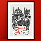 A bold black-and-white illustration of Copenhagen’s iconic architecture, anchored by a striking red bicycle at the base of the design.