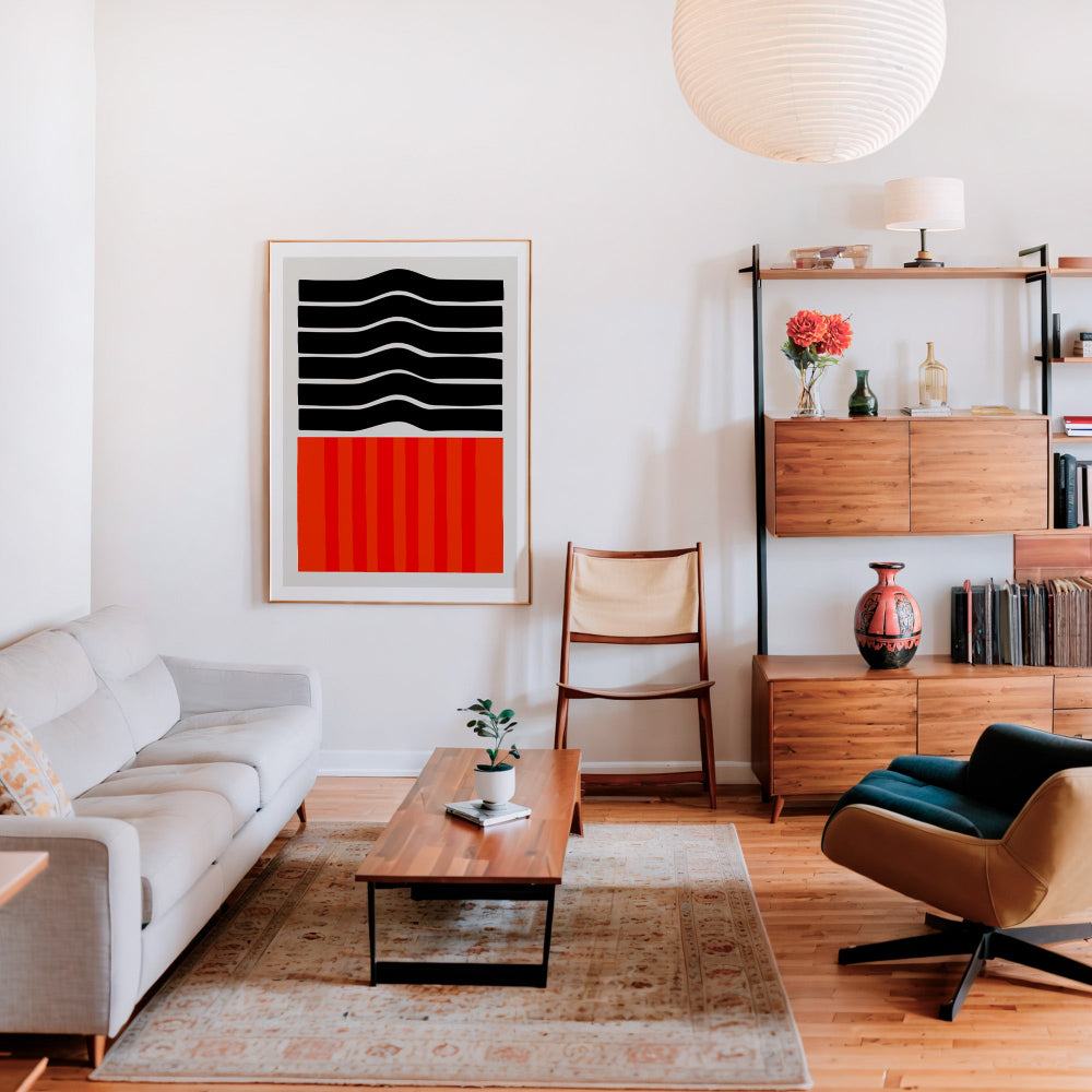 Ember art print framed in a stylish living area, with its striking colour blocks and simple form providing a graphic focal point in a cosy contemporary home.
