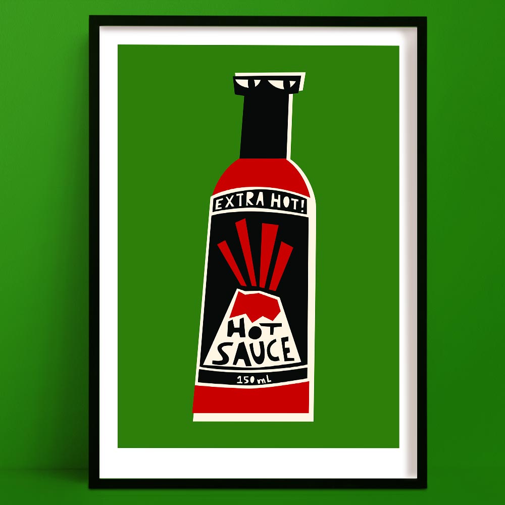 Extra Hot Sauce art print featuring a red and black bottle with bold rays and face illustration, framed on green wall.