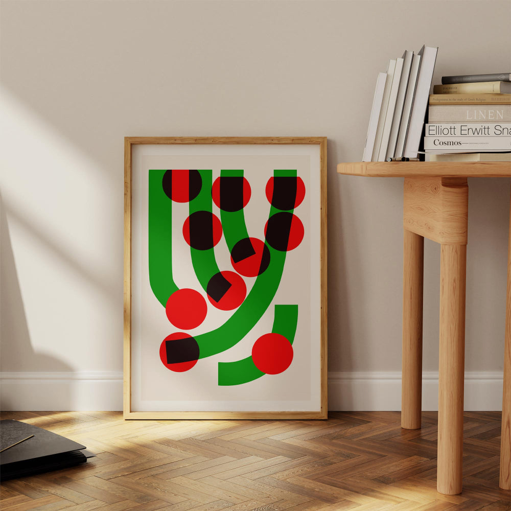 The Green Grass abstract print styled casually on the floor against a minimalist wall, radiating retro energy and a hint of graphic mischief.

