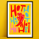 Vibrant art print featuring bold typography and a red chilli on yellow.