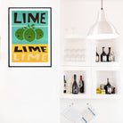 Lime artwork displayed above modern shelves, brightening the room with a tropical twist.