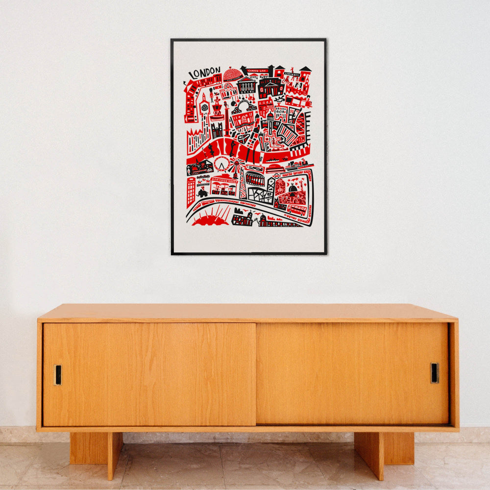 London city map artwork displayed above a minimalist wooden console, offering a vibrant, energetic touch to a contemporary room setting.
