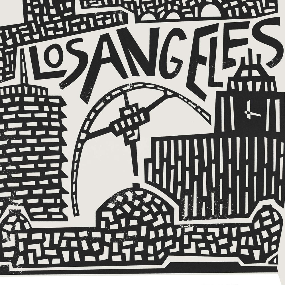 A zoomed-in view of the Los Angeles city art print showing linework of key architecture with “Los Angeles” lettering nestled between landmarks.
