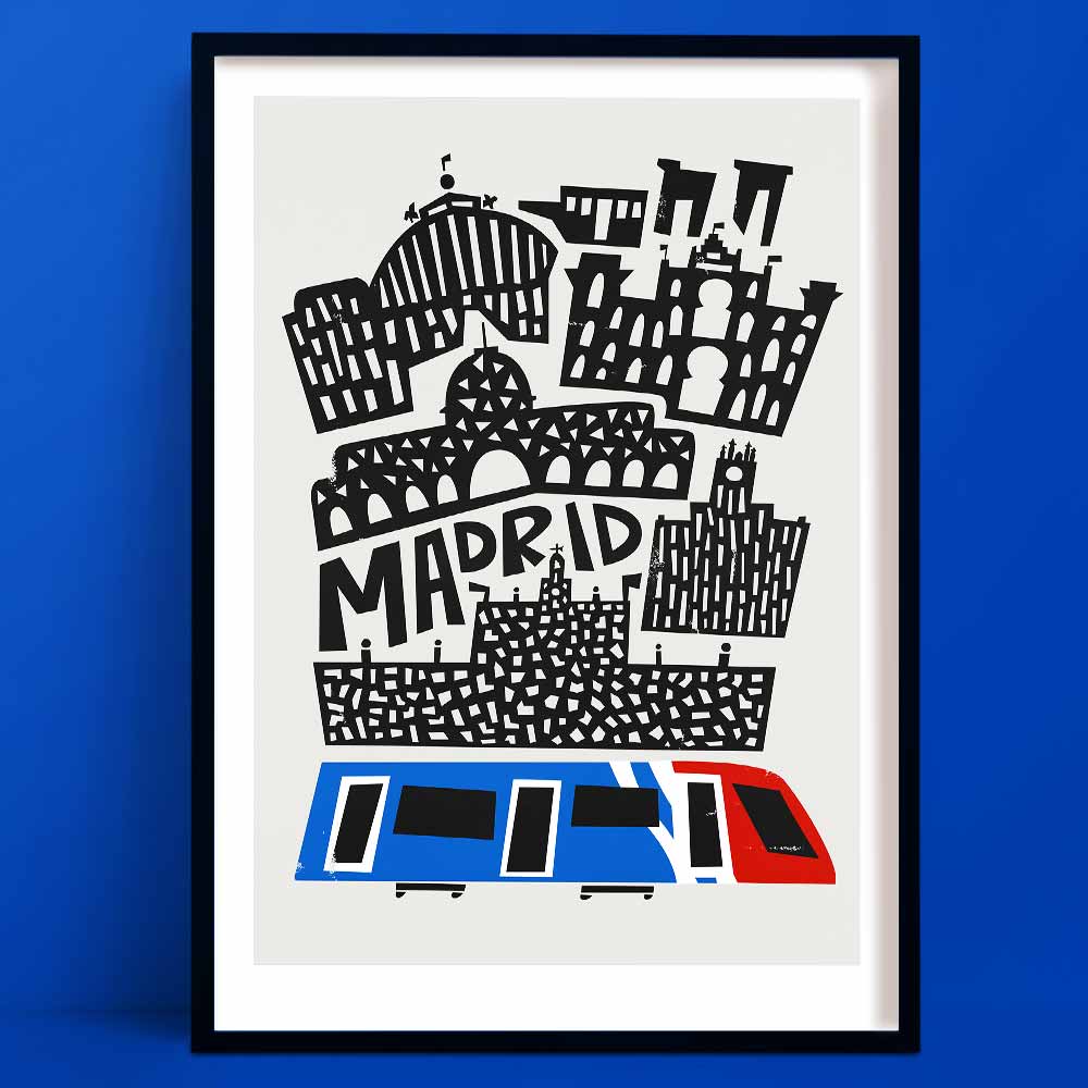 Stylised Madrid art print with layered black linework architecture above a colourful red, white and blue city train, framed on a rich cobalt wall.