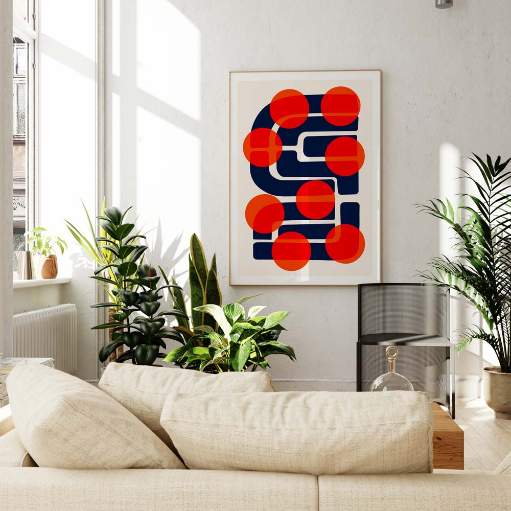 The Many Suns print displayed in a bright, modern interior; the vibrant interplay of colour and form adds energy and structure to a minimalist setting.
