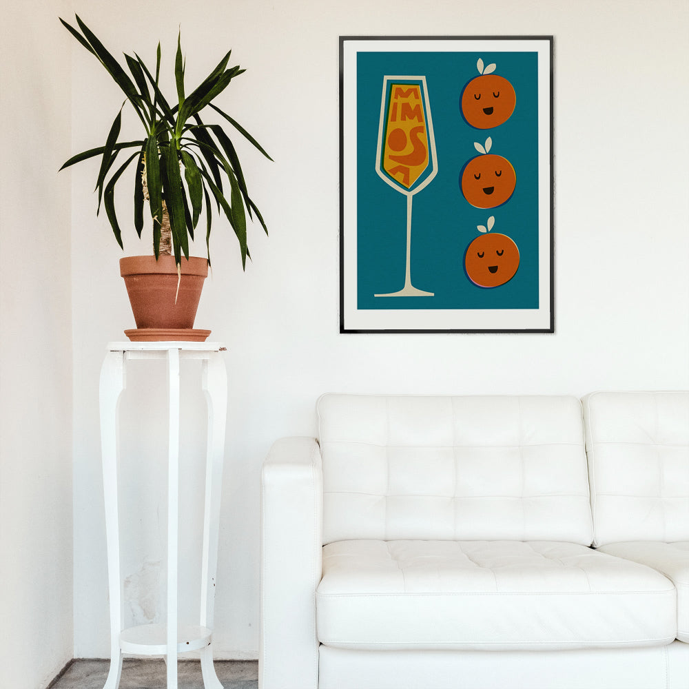 Mimosa cocktail poster framed above a white sofa and houseplant in a crisp, minimal interior.
