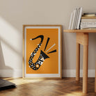 Jan saxophone in wooden frame sat on wood floor next to dining room table
