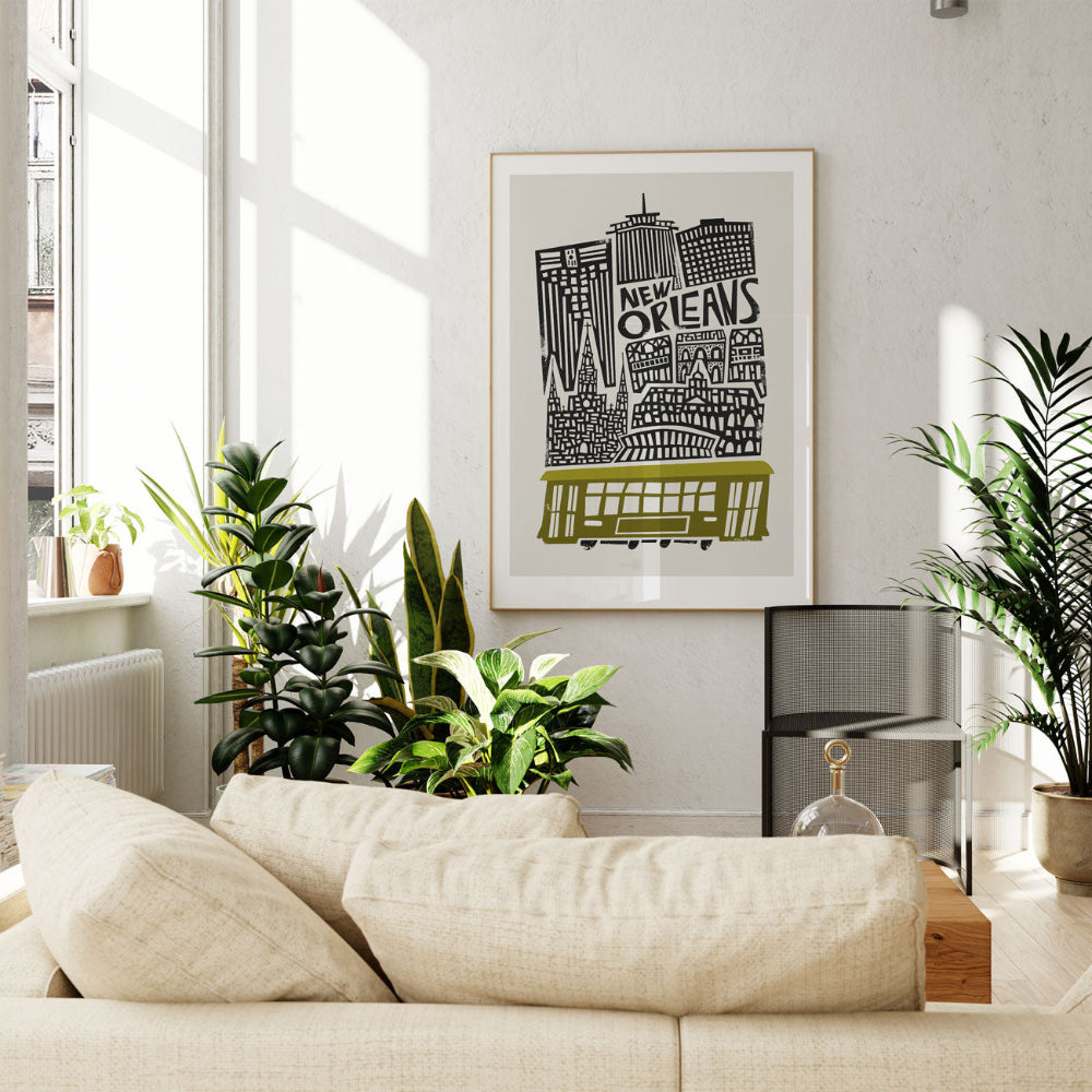 The New Orleans art print hanging above a soft cream couch, bringing a touch of jazz-era charm to a bright, contemporary living room.