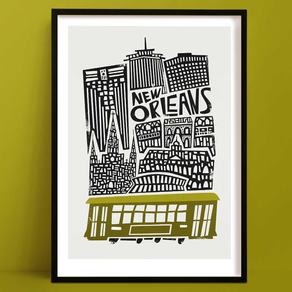 A playful black and white line illustration of New Orleans’ skyline, crowned with a classic olive green streetcar, evoking the city’s soulful rhythm.
