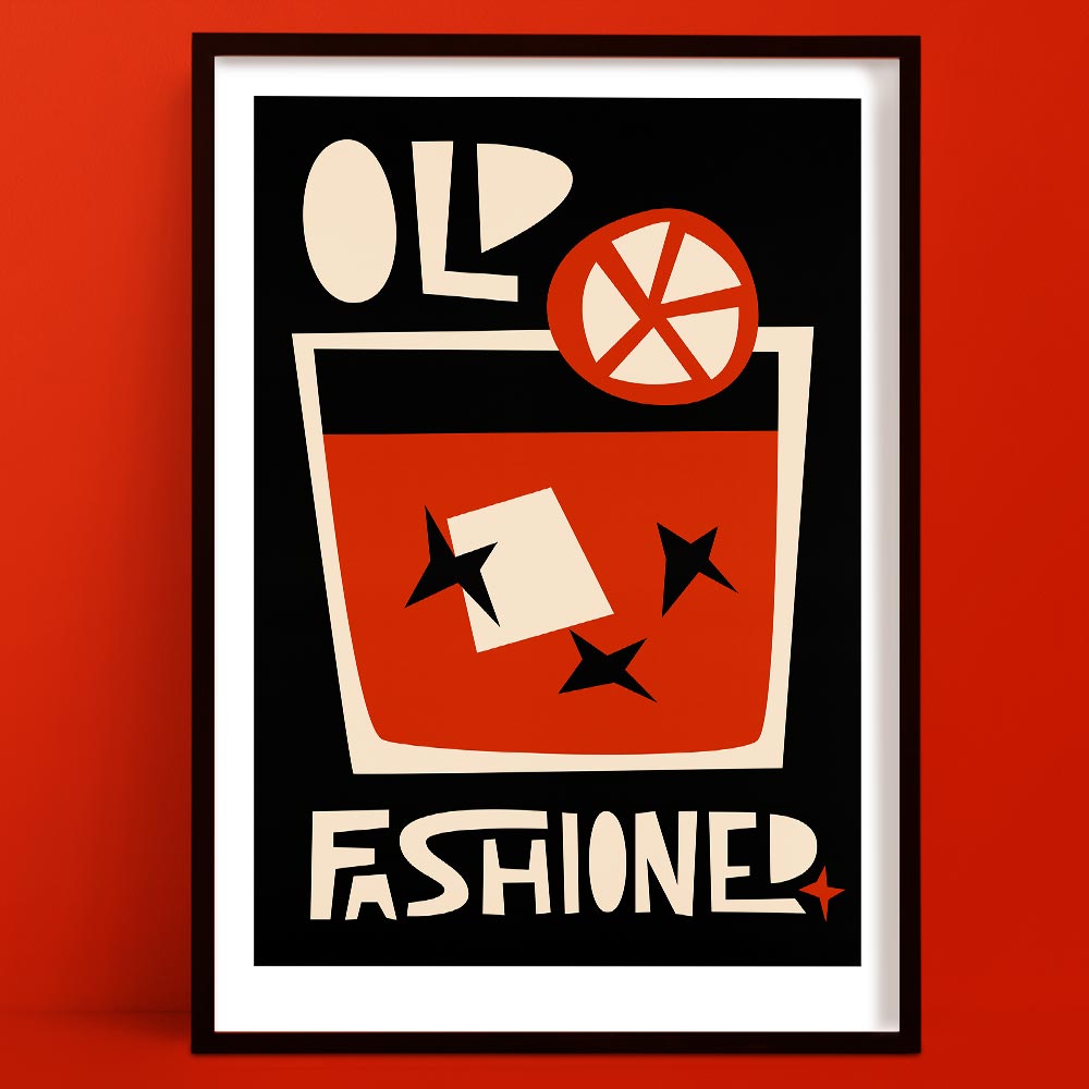 Old Fashioned cocktail art print with a bold glass illustration, abstract orange slice and star anise shapes, framed on a deep terracotta wall.