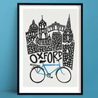 An Oxford print featuring a monochrome illustration of the city's iconic skyline, featuring a hand-drawn bicycle in blue, symbolising the city’s academic spirit and beloved cycling culture.