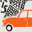 Close-up view of the red vintage car in the Paris print, showing simplified yet stylish lines with bold contrast against the architectural backdrop.
