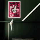 bold pink typography peace print by fox and velvet of a celebration of Berlin Wall falling in 1989 against a green wall in modern apartment