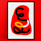 Framed abstract art print with red background and black, yellow, and white curves
