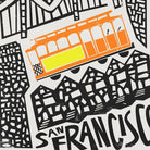 A detailed view highlighting the classic San Francisco tram in warm orange and yellow tones, set against a textured backdrop of stylised Victorian houses.
