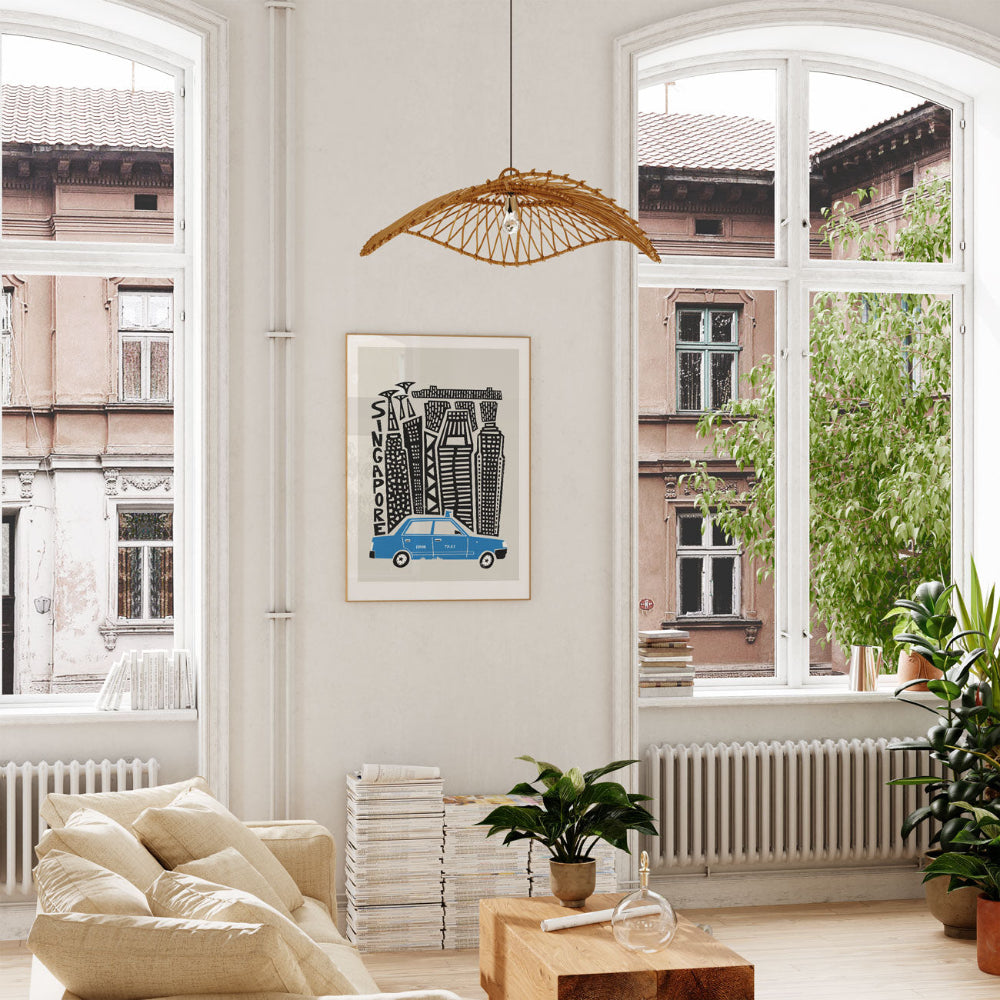 The Singapore city print styled in a bright room with large windows and soft furnishings, adding a modern touch.