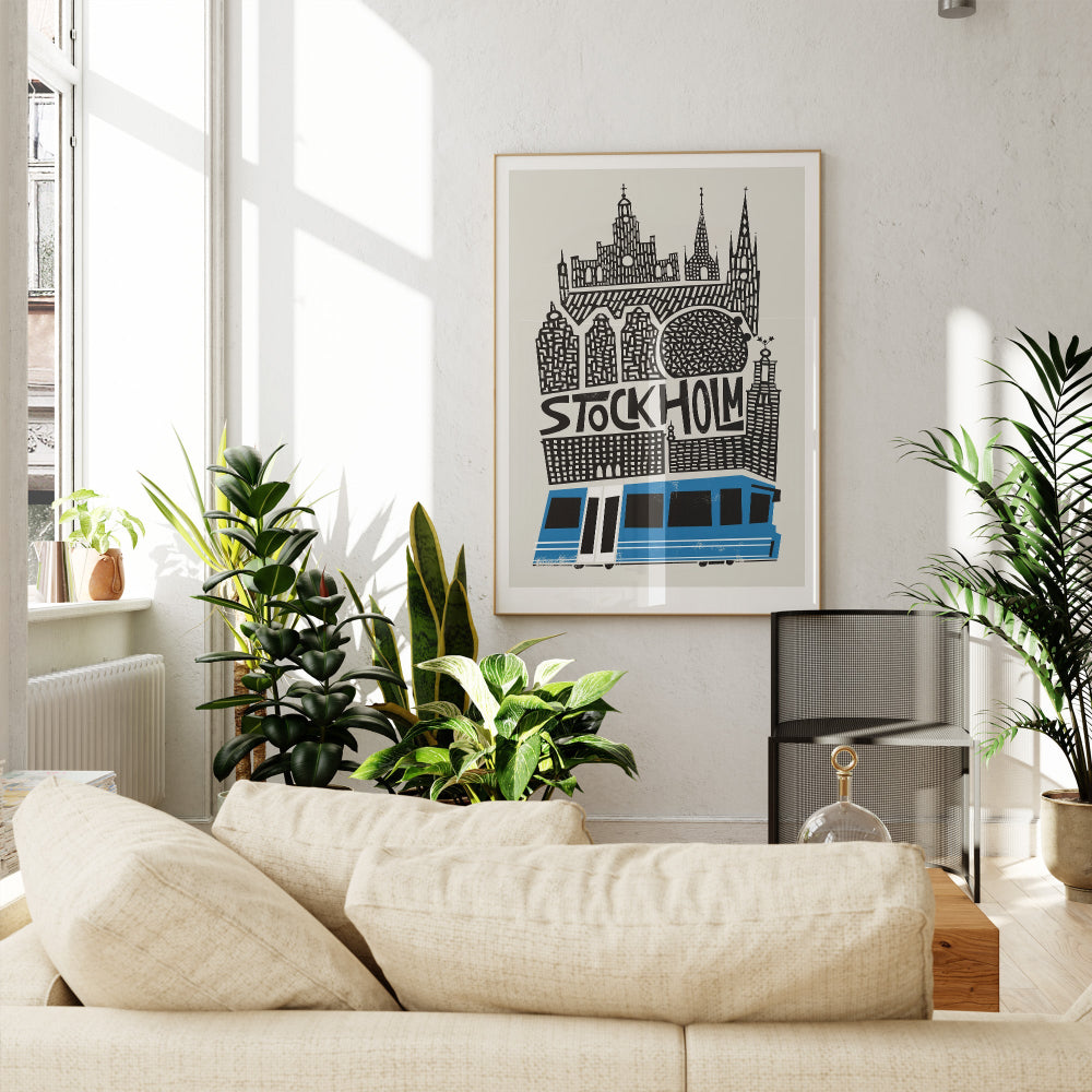 The Stockholm print hanging in a bright, leafy interior with natural light, styled with modern minimalism and a pop of blue.