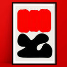 A sundown abstract wall art piece is a minimalist abstract art print featuring a rich red organic cloud shape hovering above a bold black form, evoking the drama of a setting sun on the horizon.
