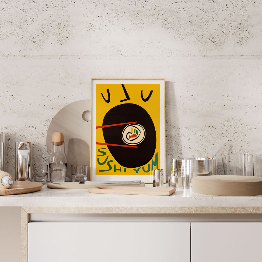Sushi Yum print styled in a minimalist kitchen setting, adding punchy yellow tones and quirky food energy to the counter display.