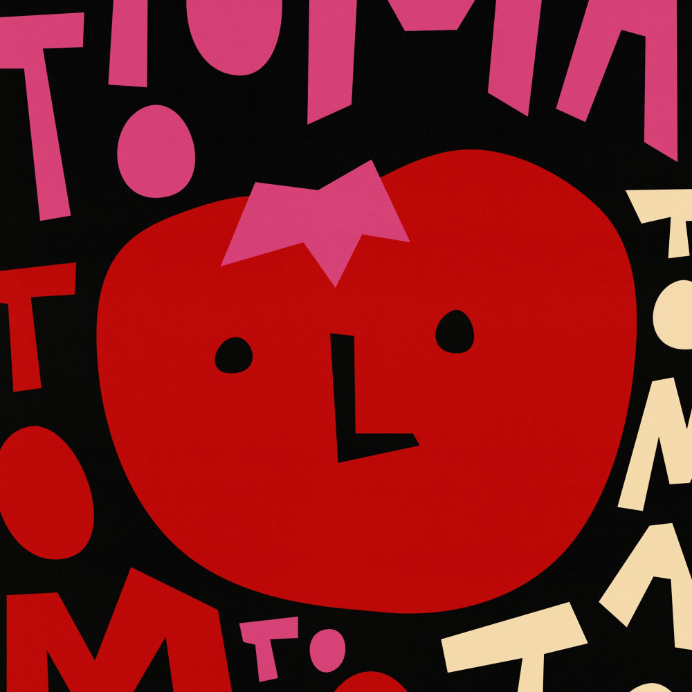 Close-up of the stylised tomato face with expressive eyes and quirky font shapes.