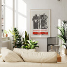 The Toronto print displayed above a beige sofa in a cosy corner, balancing crisp urban lines with the warmth of a handmade, screenprint-inspired texture.
