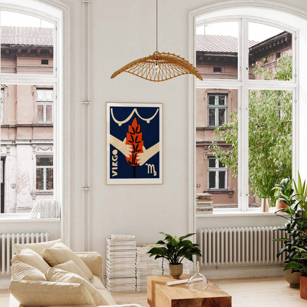 Virgo zodiac print framed in a bright, airy interior with large windows and indoor plants.