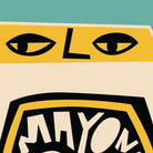 Close-up of the mayonnaise label showing stylised eyes and warped hand-drawn text.