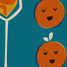 Close-up view showing the playful orange faces and the elegant stem of a champagne flute filled with bubbly orange text.